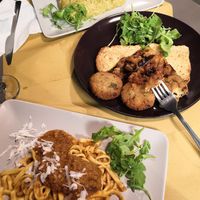 Asparagus risotto, brown rice and tofu croquettes with caponatta, tagliatelle with seitan rague at Il Vegano Bistrot in Florence