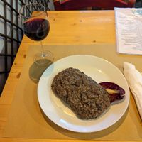 shitake mushroom risotto and house red wine at Il Vegano Bistrot in Florence