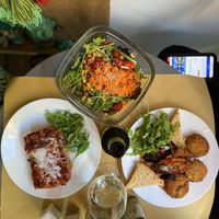 Salad (back) lasagne (front left) croquettes (front right)   at Il Vegano Bistrot in Florence