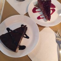 Vegan chocolate and pears cake and vegan cheesecake. Delicious! at Il Vegano Bistrot in Florence