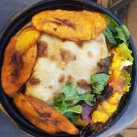 Special of the day Poori stuffed with Chana Dahl served with plantain. at One Love Maebelle's Cafe in Worcester