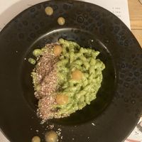 Pasta with pesto, fermented tomato and crispy citrus panko   at Romeow Cat Bistrot in Rome