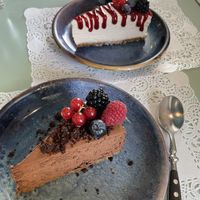 White cake and chocolate mousse cake  at Romeow Cat Bistrot in Rome