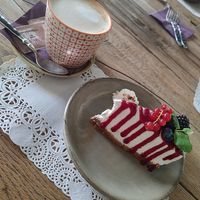 Hazelnut Milk Coffee and Cheesecake 🫐 at Romeow Cat Bistrot in Rome