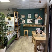 Cute cafe interior with 8 seats  at Estacion Quimera in Malaga