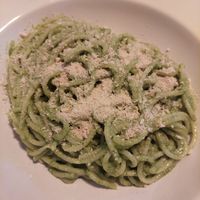 Espaguetis al pesto con parmesano vegano at Estacion Quimera in Malaga