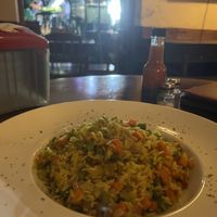 Arroz con vegetales with a view of the band! Awesome place   at ViaVia in Leon