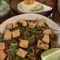 Pad thai (great) with the thai curry at the back (not great)  at Ikaro Cafe in Santa Marta