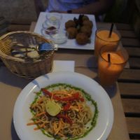 asian salad, house juice, falafel at Kafe Botanika in San Sebastian