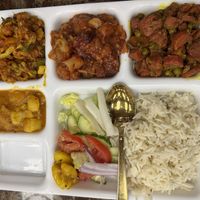 All Vegan Thaali - Potato, Mixed Veggies, Manchurian and Carrots and Peas curries with rice, pickle and salad  at Prem Sweets and Restaurant in Brampton