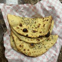 Tandoori Roti (whole wheat flat bread cooked in tandoor/coal oven) - Vegan  at Prem Sweets and Restaurant in Brampton