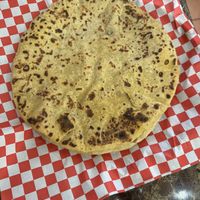 Vegan Aloo Paratha (stuffed flat bread with potatoes) no butterr  at Prem Sweets and Restaurant in Brampton