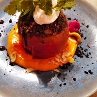 Baked tomato filled with couscous and vegetables at La Isleta de La Vina in Cadiz