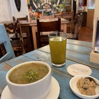 Sopa del día, agua y postre.   at Prana in Envigado