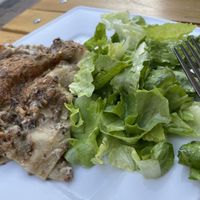 Mushroom lasagna with salad at Mariposa in Nuremberg