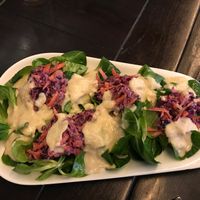 Raw salad with creamy cashew dressing  at Mariposa in Nuremberg