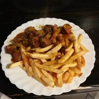 Curry wurst with fries at Vegöner - Johannis in Nuremberg
