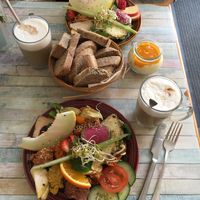 Big and small breakfast plates. Lattes. at Geh Veg in Berlin