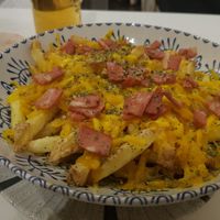 Cheddar and bacon potatoes at El Oju in Granada