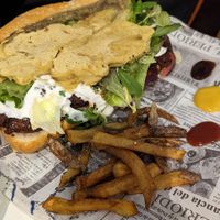 Chorizo and tortilla sandwich (this was MASSIVE) at El Oju in Granada