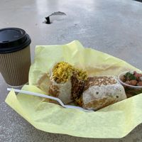 If you look closely you can see 2 of the 3 garbanzos in this burrito that claims to have chana. Also no lentils or sauce. Pretty much 3/4 cup of safron rice in a tortilla for $10   at Appu's Cafe in Long Beach