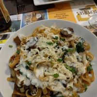 pasta with mushrooms, cream and spinach. at Mezzaluna in Saint-laurent-blangy