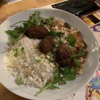 Korma curry with vegetable koftes and basmati rice at Mezzaluna in Saint-laurent-blangy