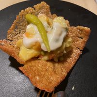 Ensaladilla sobre hoja de arroz at Casa Chema in Oviedo