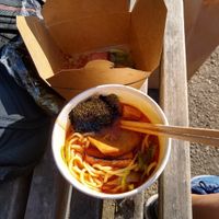 Having vegan ramen on a sunny day on a bench in the park. at Shizen Vegan Sushi Bar in San Francisco