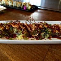 Boddy and Soul Roll (tempura fried roll with spicy bean curd, tapioca, negi, ito togarashi, sesame, red chili sauce). at Shizen Vegan Sushi Bar in San Francisco