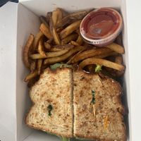 Jamaican Spice TLT with fries   at Quickie Too in Tacoma