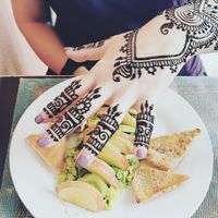 Avocado toast with freshly done Henna at Marrakech Henna Art Cafe in Marrakech