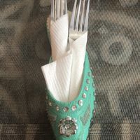 Cutlery arrives in these repurposed shoes at Marrakech Henna Art Cafe in Marrakech