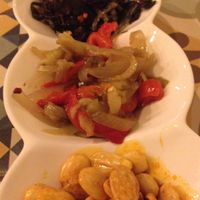 Three starters- (top to bottom) the seaweed salad, roasted veg, and paprika almonds  at VEGA - Luna in Madrid