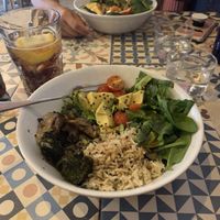 Hawaiian poké bowl with Thai bowl in the background at VEGA - Luna in Madrid