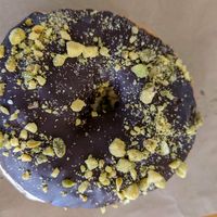 Donut topped with chocolate and pistachios 👌 at Tart Bakery - Grey Lynn in Auckland