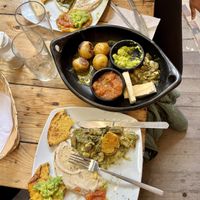 Sharing a dish and two arepas   at Nativa in Bogota