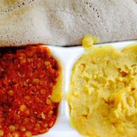 Injera, red lentils and yellow split peas in veggie combo at Keren in Washington