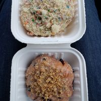 Top: birthday cake. Bottom: blueberry maple fritter. In compostable packaging! at Beechwood Doughnuts in St Catharines