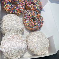Sprinkle and Coconut Cream Doughnuts  at Beechwood Doughnuts in St Catharines