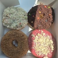 From top left clockwise: birthday cake, cosmic brownie, wild berry pie, French toastt  at Beechwood Doughnuts in St Catharines