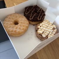 Glazed, Brownie and Banana Fritter  at Beechwood Doughnuts in St Catharines