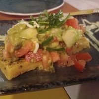 Chickpeas bread with tomato and avocadoa at Astrid in Malaga