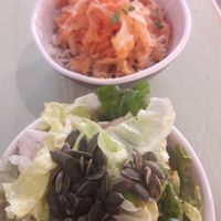 Tapas sized salad with vegan cheese + kimchi with rice. Especially kimchi was delicious. at Astrid in Malaga