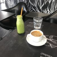 Green ginger smoothie, coffee with oat milk  at Blueorange Coffee and Bagel - Alserbachstrasse in Vienna