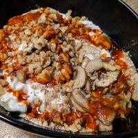 Mushrooms & walnuts as topping at Lezizel Manti in Munich