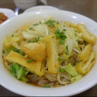 close-up lovely tofu noodle soup at 999 Shan Noodle Shop in Yangon
