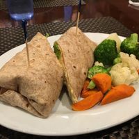 Hummus wrap and side steamed veggies  at Violette's Vegan Organic Cafe and Juice Bar in Las Vegas