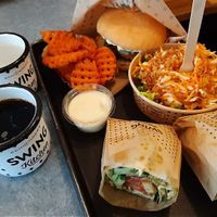 Burger, Wraps, Salat, Pommes mit Dip at Swing Kitchen - Schottenfeldgasse in Vienna