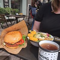Swing burger & caesar bowl at Swing Kitchen - Schottenfeldgasse in Vienna